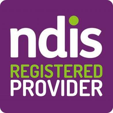 The image is a logo with a purple background featuring the text "ndis REGISTERED PROVIDER" in the footer. The word "ndis" is in large white letters, with the dot on the 'i' in green, while "REGISTERED PROVIDER" is in uppercase letters, with "REGISTERED" in green and "PROVIDER" in white.